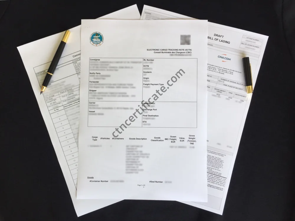 A commercial invoice, a bill of lading and the ECTN certificate with a pen on a black background. Transit shipments
