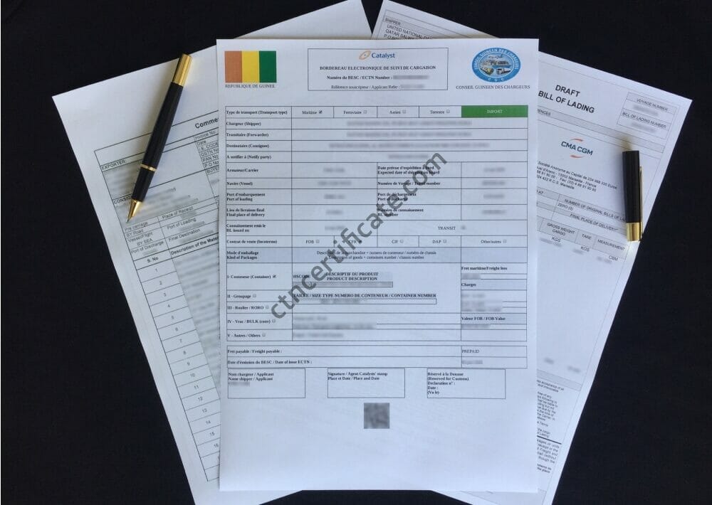 A commercial invoice, a bill of lading and the ECTN certificate for Guinea Conakry with a pen on a black background.