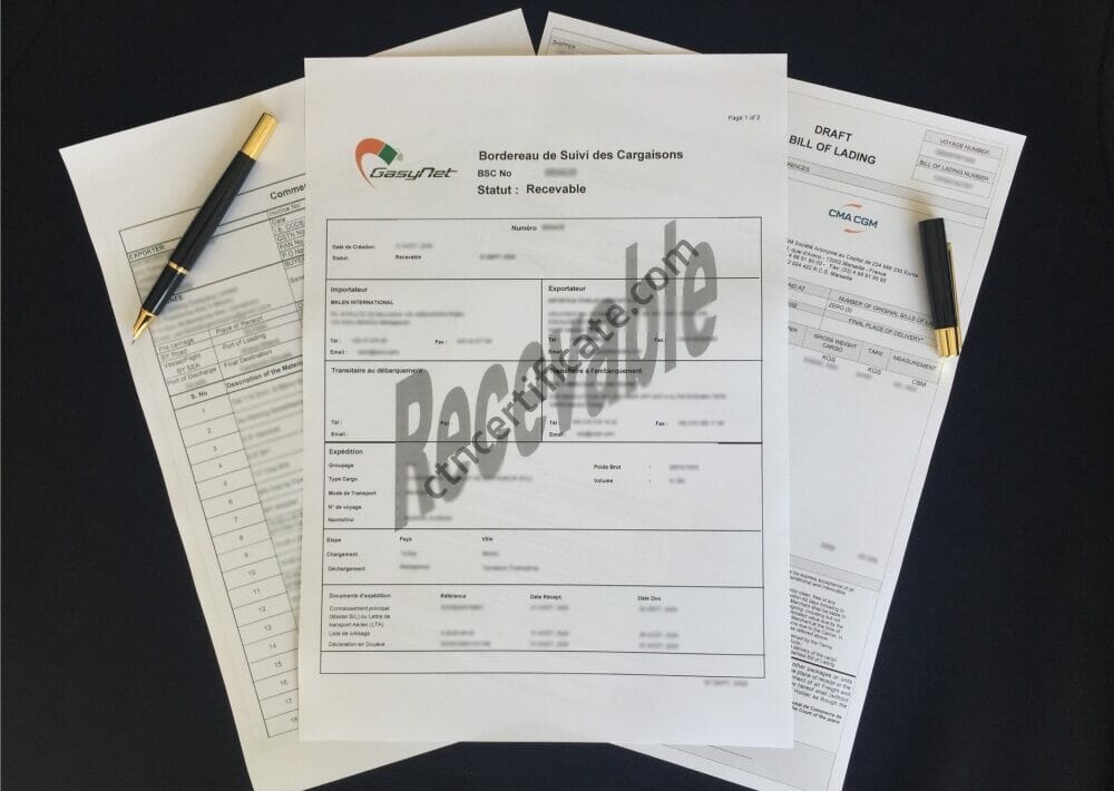 A commercial invoice, a bill of lading and the BSC certificate for Madagascar with a pen on a black background.