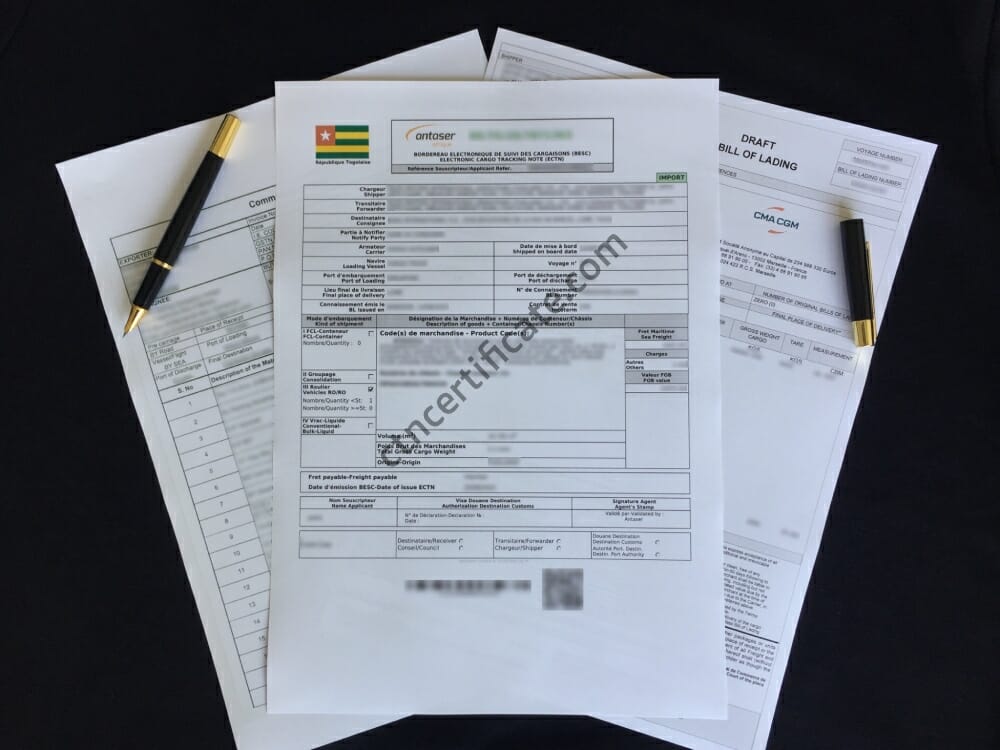 A commercial invoice, a bill of lading and the ECTN certificate for Togo with a pen on a black background.